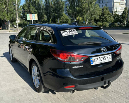 Черный Мазда 6, объемом двигателя 2.19 л и пробегом 147 тыс. км за 13500 $, фото 2 на Automoto.ua