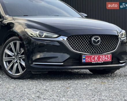 Черный Мазда 6, объемом двигателя 2.2 л и пробегом 178 тыс. км за 19450 $, фото 1 на Automoto.ua