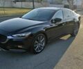 Черный Мазда 6, объемом двигателя 2.5 л и пробегом 193 тыс. км за 9100 $, фото 1 на Automoto.ua