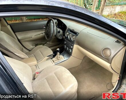 Чорний Мазда 6, об'ємом двигуна 1.8 л та пробігом 350 тис. км за 1450 $, фото 4 на Automoto.ua