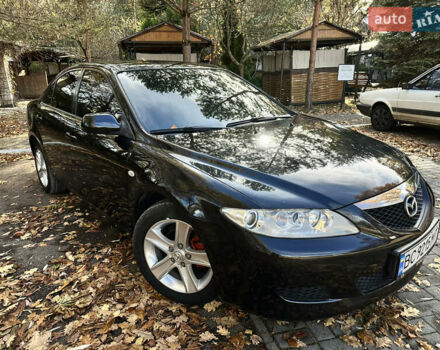 Черный Мазда 6, объемом двигателя 1.8 л и пробегом 230 тыс. км за 3650 $, фото 2 на Automoto.ua