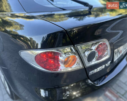 Черный Мазда 6, объемом двигателя 1.8 л и пробегом 230 тыс. км за 3999 $, фото 40 на Automoto.ua
