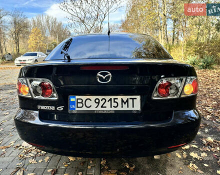 Черный Мазда 6, объемом двигателя 1.8 л и пробегом 230 тыс. км за 3650 $, фото 8 на Automoto.ua