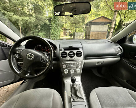 Черный Мазда 6, объемом двигателя 1.8 л и пробегом 230 тыс. км за 3650 $, фото 31 на Automoto.ua