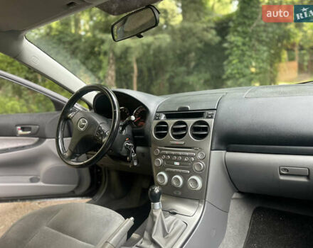 Черный Мазда 6, объемом двигателя 1.8 л и пробегом 230 тыс. км за 3999 $, фото 98 на Automoto.ua