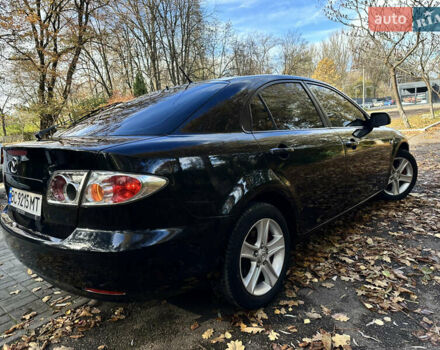 Черный Мазда 6, объемом двигателя 1.8 л и пробегом 230 тыс. км за 3650 $, фото 7 на Automoto.ua