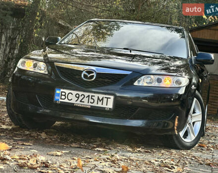 Черный Мазда 6, объемом двигателя 1.8 л и пробегом 230 тыс. км за 3650 $, фото 4 на Automoto.ua