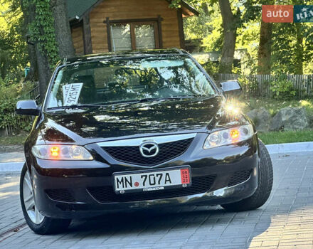 Черный Мазда 6, объемом двигателя 1.8 л и пробегом 230 тыс. км за 3999 $, фото 1 на Automoto.ua