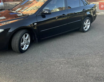 Чорний Мазда 6, об'ємом двигуна 2 л та пробігом 229 тис. км за 5600 $, фото 2 на Automoto.ua