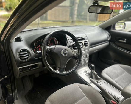 Черный Мазда 6, объемом двигателя 1.8 л и пробегом 230 тыс. км за 3999 $, фото 72 на Automoto.ua