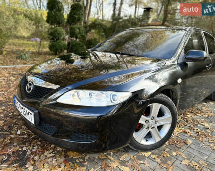 Черный Мазда 6, объемом двигателя 1.8 л и пробегом 230 тыс. км за 3650 $, фото 6 на Automoto.ua