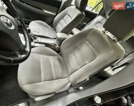 Черный Мазда 6, объемом двигателя 1.8 л и пробегом 230 тыс. км за 3999 $, фото 75 на Automoto.ua