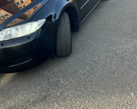 Чорний Мазда 6, об'ємом двигуна 2 л та пробігом 229 тис. км за 5600 $, фото 1 на Automoto.ua