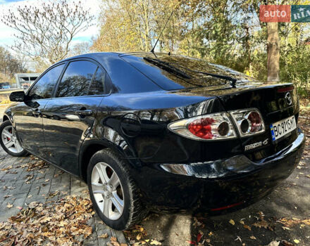 Черный Мазда 6, объемом двигателя 1.8 л и пробегом 230 тыс. км за 3650 $, фото 3 на Automoto.ua