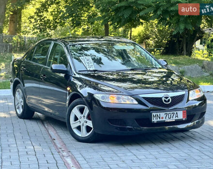 Черный Мазда 6, объемом двигателя 1.8 л и пробегом 230 тыс. км за 3999 $, фото 5 на Automoto.ua