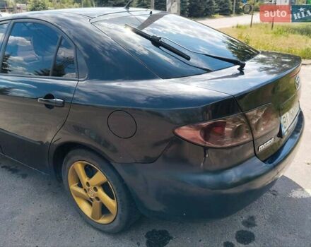 Чорний Мазда 6, об'ємом двигуна 2 л та пробігом 316 тис. км за 4700 $, фото 4 на Automoto.ua