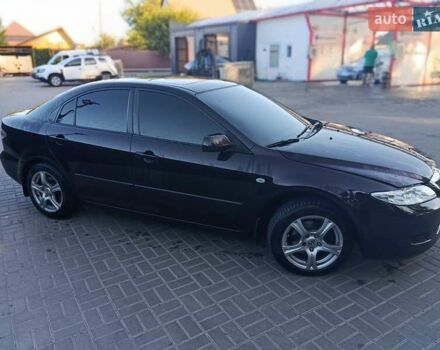 Черный Мазда 6, объемом двигателя 2 л и пробегом 222 тыс. км за 4800 $, фото 2 на Automoto.ua