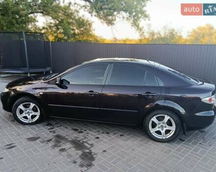 Черный Мазда 6, объемом двигателя 2 л и пробегом 222 тыс. км за 4800 $, фото 1 на Automoto.ua