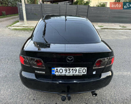 Черный Мазда 6, объемом двигателя 2 л и пробегом 210 тыс. км за 4600 $, фото 5 на Automoto.ua