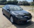 Черный Мазда 6, объемом двигателя 2 л и пробегом 182 тыс. км за 5100 $, фото 1 на Automoto.ua