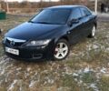 Черный Мазда 6, объемом двигателя 1.8 л и пробегом 233 тыс. км за 5150 $, фото 1 на Automoto.ua