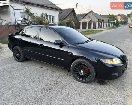 Черный Мазда 6, объемом двигателя 2 л и пробегом 210 тыс. км за 4600 $, фото 2 на Automoto.ua