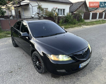 Черный Мазда 6, объемом двигателя 2 л и пробегом 210 тыс. км за 4600 $, фото 1 на Automoto.ua