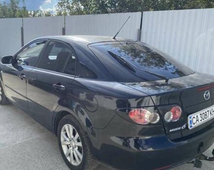 Черный Мазда 6, объемом двигателя 2 л и пробегом 182 тыс. км за 5100 $, фото 1 на Automoto.ua