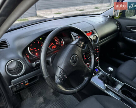 Черный Мазда 6, объемом двигателя 2 л и пробегом 210 тыс. км за 4600 $, фото 12 на Automoto.ua