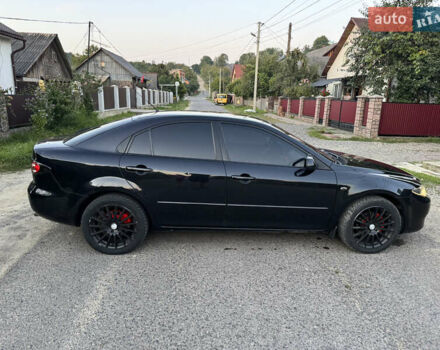 Черный Мазда 6, объемом двигателя 2 л и пробегом 210 тыс. км за 4600 $, фото 3 на Automoto.ua