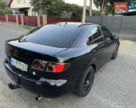 Черный Мазда 6, объемом двигателя 2 л и пробегом 210 тыс. км за 4600 $, фото 4 на Automoto.ua