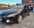 Черный Мазда 6, объемом двигателя 2 л и пробегом 184 тыс. км за 6900 $, фото 1 на Automoto.ua