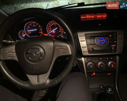 Чорний Мазда 6, об'ємом двигуна 1.8 л та пробігом 174 тис. км за 6500 $, фото 1 на Automoto.ua