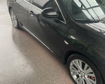 Черный Мазда 6, объемом двигателя 2 л и пробегом 274 тыс. км за 7200 $, фото 1 на Automoto.ua