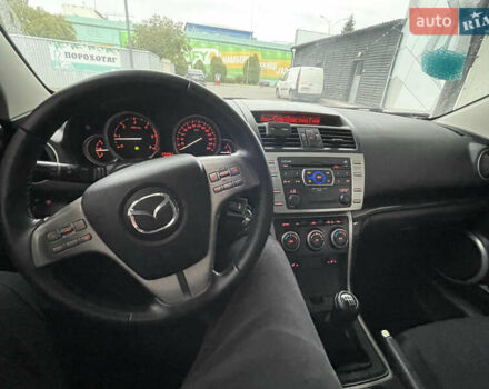 Черный Мазда 6, объемом двигателя 2 л и пробегом 274 тыс. км за 7200 $, фото 8 на Automoto.ua
