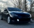 Черный Мазда 6, объемом двигателя 2 л и пробегом 199 тыс. км за 6500 $, фото 1 на Automoto.ua