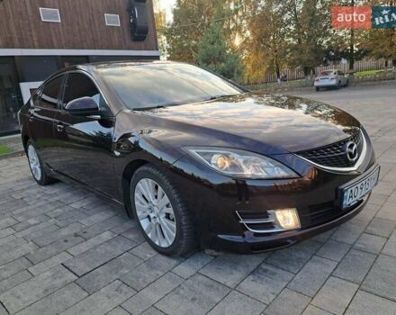 Черный Мазда 6, объемом двигателя 2 л и пробегом 184 тыс. км за 6900 $, фото 1 на Automoto.ua