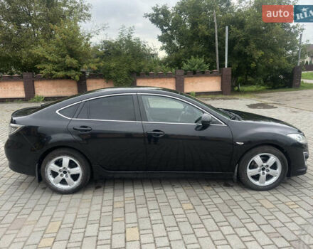 Черный Мазда 6, объемом двигателя 2.2 л и пробегом 258 тыс. км за 7500 $, фото 1 на Automoto.ua