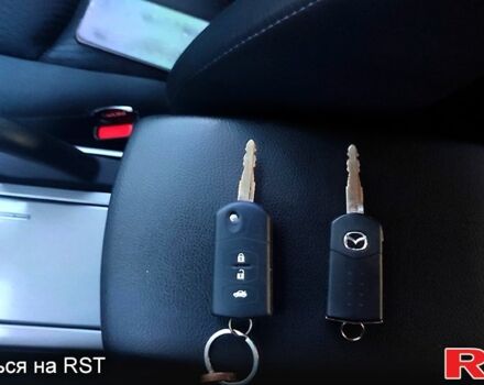 Черный Мазда 6, объемом двигателя 2.2 л и пробегом 292 тыс. км за 7700 $, фото 8 на Automoto.ua