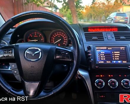 Черный Мазда 6, объемом двигателя 2.2 л и пробегом 292 тыс. км за 7700 $, фото 7 на Automoto.ua