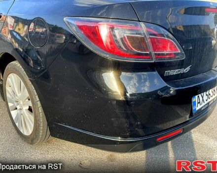 Черный Мазда 6, объемом двигателя 2 л и пробегом 206 тыс. км за 9300 $, фото 6 на Automoto.ua