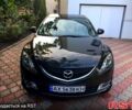 Черный Мазда 6, объемом двигателя 2 л и пробегом 206 тыс. км за 9300 $, фото 1 на Automoto.ua