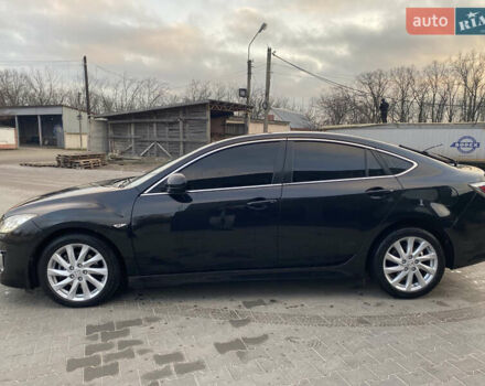 Черный Мазда 6, объемом двигателя 2.18 л и пробегом 270 тыс. км за 7800 $, фото 1 на Automoto.ua