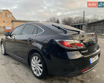 Черный Мазда 6, объемом двигателя 2.18 л и пробегом 270 тыс. км за 7800 $, фото 6 на Automoto.ua