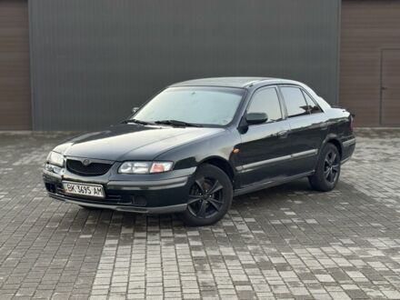 Черный Мазда 6, объемом двигателя 2 л и пробегом 300 тыс. км за 1800 $, фото 1 на Automoto.ua