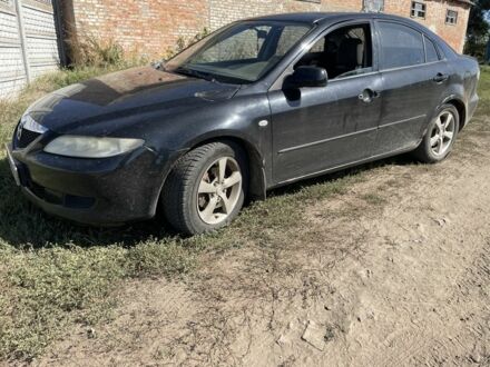 Черный Мазда 6, объемом двигателя 0 л и пробегом 322 тыс. км за 2950 $, фото 1 на Automoto.ua