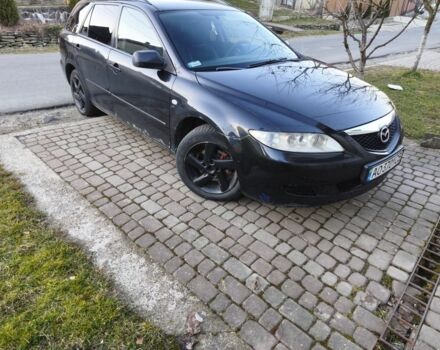Черный Мазда 6, объемом двигателя 2 л и пробегом 350 тыс. км за 3050 $, фото 1 на Automoto.ua