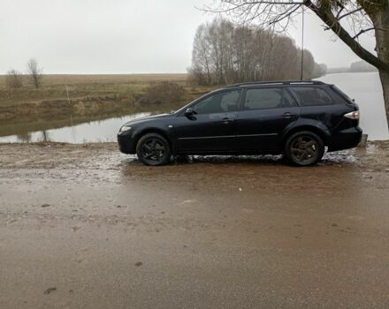 Черный Мазда 6, объемом двигателя 2 л и пробегом 298 тыс. км за 1650 $, фото 1 на Automoto.ua