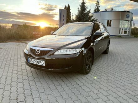 Черный Мазда 6, объемом двигателя 2 л и пробегом 295 тыс. км за 3650 $, фото 1 на Automoto.ua