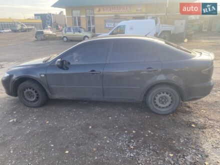 Черный Мазда 6, объемом двигателя 2 л и пробегом 287 тыс. км за 3800 $, фото 1 на Automoto.ua